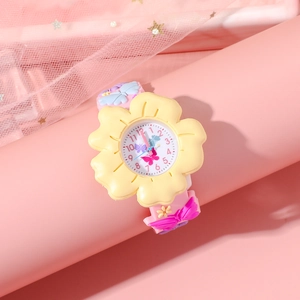 Close-up of yellow flower-shaped kids watch with butterfly pattern and silicone strap
