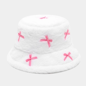 White plush bucket hat with pink satin bows for a sweet autumn winter style