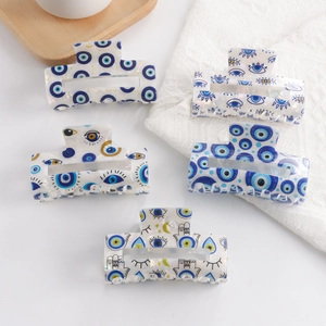 Chic PVC evil eye hair claw clips set with blue motifs and mother of pearl finish
