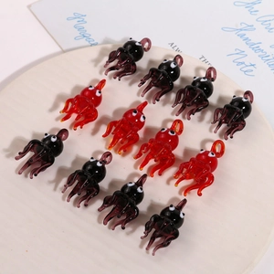 Handmade glass octopus pendants in red and black for DIY necklaces and earrings