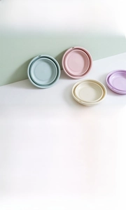 Foldable multi-purpose plastic washbasins in pastel colors for travel and home storage