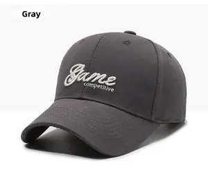 Detail of 3D Game Competitive embroidery on a dark grey structured baseball cap