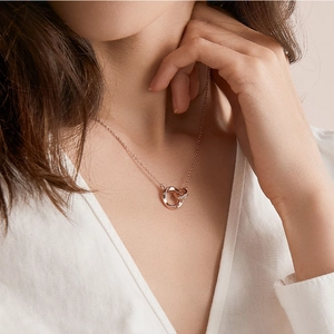 Rose gold double ring necklace with pavé cubic zirconia for couples jewelry