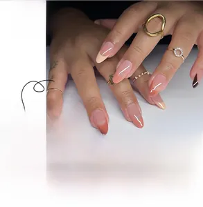 Detail of pink French press-on nails with brown tips and white fine line accents