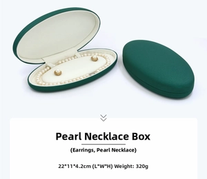 Dark green oval PU leather jewelry box with velvet lining, dimensions 22x11x4.2cm