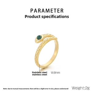 Detailed macro view of gold snake ring featuring green malachite stone and 8mm scales