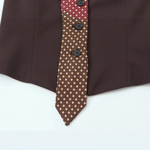 Brown sleeveless vest with geometric tie and black buttons in retro preppy style