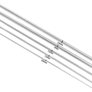 Detail view of silver stainless steel snake chains in five different thicknesses from 0.9mm to 2.4mm