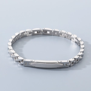 Detailed close-up of polished stainless steel link bracelet with S.STEEL engraved buckle
