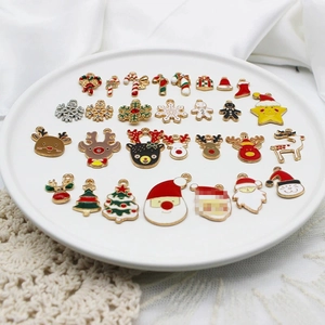 21-piece set of Christmas alloy enamel charms including Santa, reindeer, and snowflakes