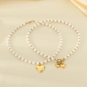 French luxury pearl beaded necklaces with heart pendants and OT toggle clasp on silk