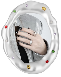 Close-up of dual-layer S925 sterling silver twist ring with baroque pearl and gems