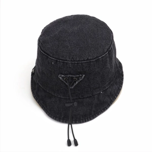 Deep grey denim bucket hat with wide brim, triangle patch and adjustable windproof rope