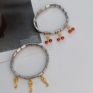 Chic stainless steel stretch bracelets featuring cherry and diamond seahorse charms