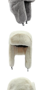 Detail of winter ushanka hat with thick faux fur earflaps and adjustable chin strap buckles