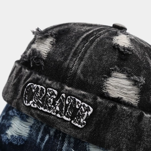 Vintage washed denim docker hat with distressed holes and CREATE letter embroidery