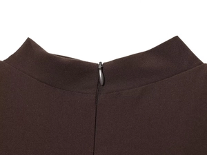 Detailed view of the dark brown ruched neckline with hidden back zipper and fabric texture