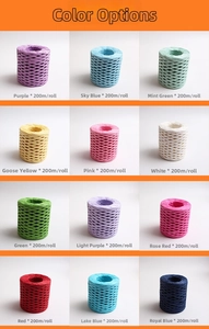 Macro shot of colorful raffia paper ropes for gift wrapping in a 200m per roll display