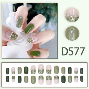 Chic green press-on nails with plaid patterns, pearls, and studs in a 24-piece set