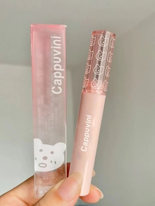 Pink glossy lip glaze by Cappuvini with cute bear design in clear packaging