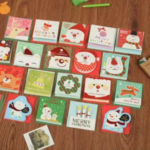 Set of 24 mini Christmas folding cards with Santa designs and gold stamped envelopes