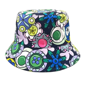 Detail of colorful floral bucket hat with rhinestone embellishments and dark background