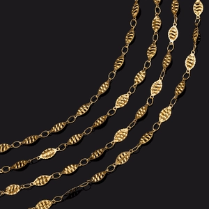 Polished gold plated stainless steel oval link chain with textured fish bone pattern