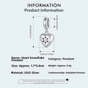 Macro detail of a 925 silver heart charm with snowflake pattern and size dimensions