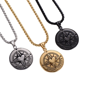 Vintage stainless steel compass heart pendants in silver, gold, and black finishes