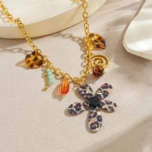 Collier en acier inoxydable doré avec fleur léopard et pendentif spirale en résine
