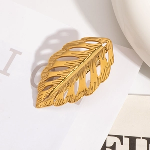 Pince à cheveux feuille dorée évidée avec texture de nervures détaillée et fini métal