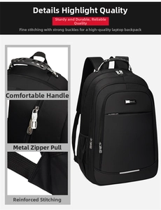 Detail of reinforced handle, metal zippers and heavy-duty stitching on black travel backpack