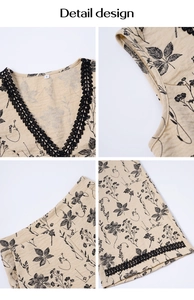Détail du col en V avec bordure en dentelle noire et imprimé fleuri sur tissu beige