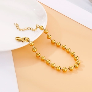 Pulsera de cuentas huecas doradas con cierre de mosquetón y cadena de extensión en plato