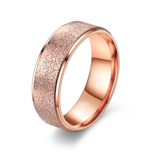 Minimalist rose gold titanium ring with frosted sand finish and polished inner band