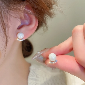 Elegant gold-plated pearl stud earrings with zircon accents and sterling silver pins