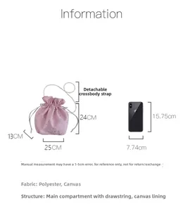 Pink drawstring canvas tote bag with silver star pattern and detachable shoulder strap