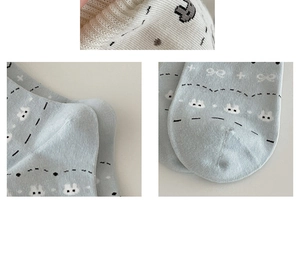 Detailed view of Fair Isle heart socks with cute rabbit prints and knitted texture