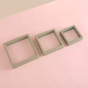 Three square PE film jewelry display boxes in olive green showing different size options