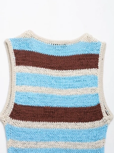 Detailed macro view of the blue and brown striped knit pattern and crochet texture