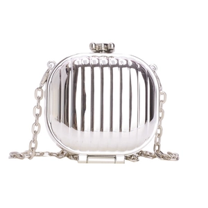 Silver metallic suitcase style mini crossbody bag with vertical stripes and chain strap