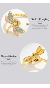 Detailansicht des drehbaren Libellenrings mit bunten Kristallen und Gold-Finish