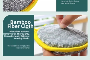 Detail of bamboo fiber cleaning pad with hanging hole and grey microfiber weave surface