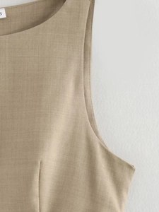 Detail of khaki sleeveless dress with textured cotton fabric and S size label