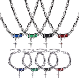 8-piece titanium steel jewelry set featuring colorful zircon pendants and cross charms