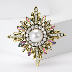 Vintage Baroque sunflower brooch with white pearls and colorful rhinestones on a gold base