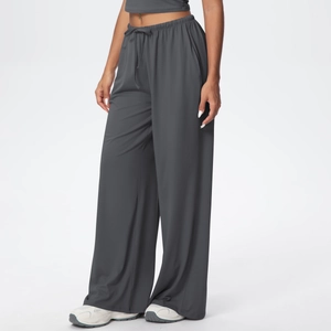 Detailed side view of high-waist dark grey wide-leg lounge pants with adjustable drawstring