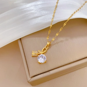 Elegant gold titanium necklace with a rose flower pendant and round white zircon gemstone