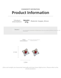 Detailed view of butterfly stud earrings with red center stone and zircon wings