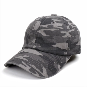 Close-up of camouflage baseball cap with six-panel structure and reinforced stitching